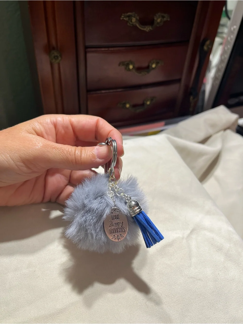 Gray Faux Fur Pom Keychain with Blue Tassel